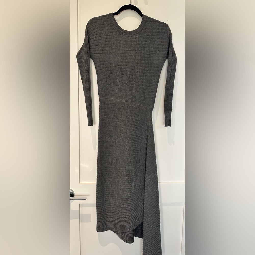 All Saints fitted sweater dress with asymmetrical length and low V cut in back.